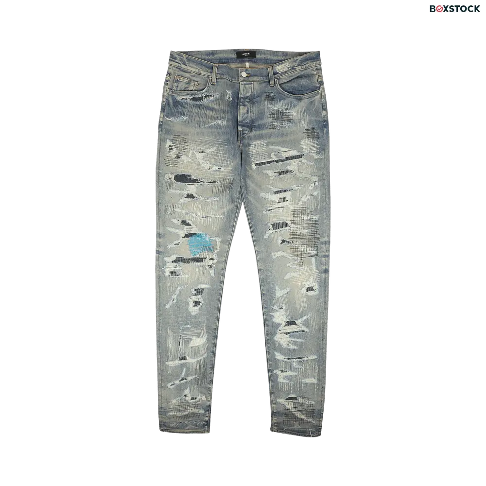 Amiri All Over Repair Jean...